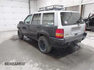 1994 Jeep Grand Cherokee Limited with VIN 1J4GZ78Y8RC165923, listed as a IAAI auction lot 42275894 with 247,977 mi miles and . Bid and sale history available at DreamBid. Image 3.