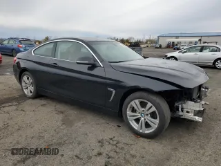 2015 BMW 4 Series 428i xDrive with VIN WBA3N5C54FK198577, listed as a Copart auction lot 50296395 with 56,607 mi miles and Salvage Title. Bid and sale history available at carsss.com. Image 4.