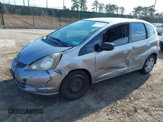 2009 Honda Fit with VIN JHMGE88279S064850, listed as a IAAI auction lot 41886951 with 185,580 mi miles. Bid and sale history available at carsss.com. Image 2.