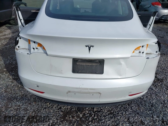 2023 Tesla Model 3 z VIN 5YJ3E1EAXPF543227, wystawiony jako IAAI lot #41150158 z przebiegiem 19 782 mil mil oraz . Historia ofert i sprzedaży dostępna na DreamBid. Obrazek 6.