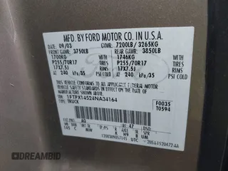 2004 Ford F-150 XLT with VIN 1FTPX14524NA34164, listed as a IAAI auction lot 41583236 with 168,780 mi miles. Bid and sale history available at carsss.com. Image 9.