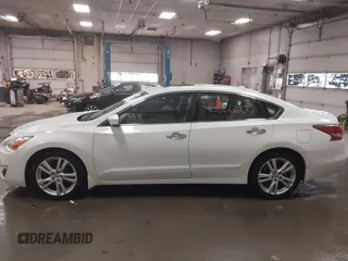 2015 Nissan Altima SL with VIN 1N4BL3AP3FC144071, listed as a IAAI auction lot 41526660 with 204,142 mi miles and . Bid and sale history available at carsss.com. Image 14.