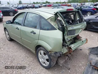 2007 Ford Focus S z VIN 1FAHP37N47W278284, wystawiony jako IAAI lot #42246383 z przebiegiem 164 830 mil mil oraz . Historia ofert i sprzedaży dostępna na DreamBid. Obrazek 3.