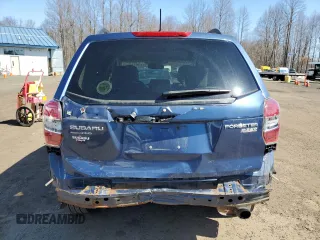2014 Subaru Forester 2.5i Premium with VIN JF2SJAEC5EH517478, listed as a Copart auction lot 52067715 with 100,707 mi miles and Salvage Title. Bid and sale history available at carsss.com. Image 6.