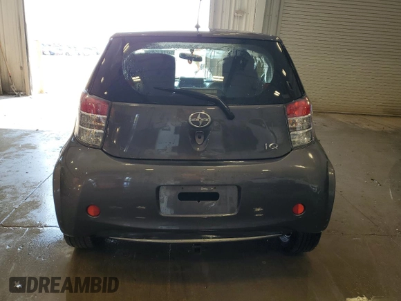 2012 Scion iQ with VIN JTNJJXB07CJ018013, listed as a Copart auction lot 57101085 with 91,370 mi miles and Non repairable. Bid and sale history available at DreamBid. Image 6.