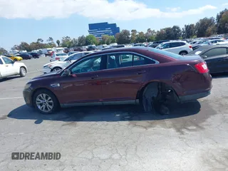 2011 Ford Taurus SEL with VIN 1FAHP2EW8BG137937, listed as a IAAI auction lot 42107586 with 143,525 mi miles. Bid and sale history available at carsss.com. Image 15.