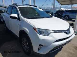 2016 Toyota RAV4 Hybrid XLE with VIN JTMRJREV5GD018607, listed as a IAAI auction lot 41970396 with 83,233 mi miles. Bid and sale history available at carsss.com. Image 1.