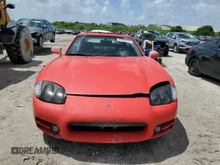 1999 Mitsubishi 3000GT GT z VIN JA3AM84J4XY001608, wystawiony jako Copart lot #64366944 z przebiegiem 153 804 mil mil oraz Tytuł czysty. Historia ofert i sprzedaży dostępna na DreamBid. Obrazek 5.