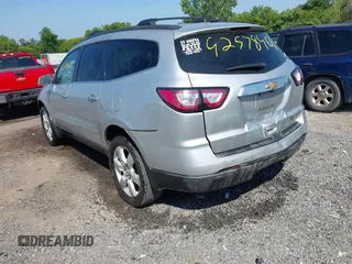 2016 Chevrolet Traverse LT with VIN 1GNKRGKD3GJ275039, listed as a IAAI auction lot 42578461 with 131,843 mi miles and . Bid and sale history available at DreamBid. Image 3.