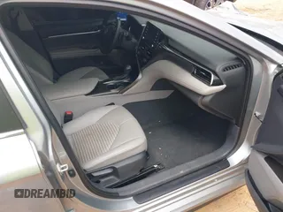 2023 Toyota Camry SE with VIN 4T1T11AK1PU736752, listed as a IAAI auction lot 41986290 with 38,636 mi miles and . Bid and sale history available at DreamBid. Image 5.