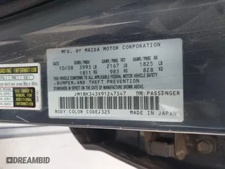 2009 Mazda Mazda3 s Touring with VIN JM1BK343X91247347, listed as a IAAI auction lot 41016374 with 1 mi miles. Bid and sale history available at carsss.com. Image 9.