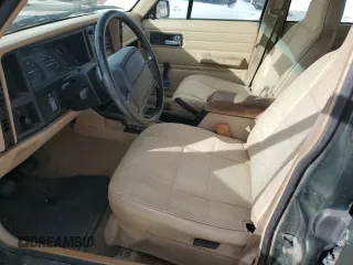 1996 Jeep Cherokee SE z VIN 1J4FJ28S9TL211073, wystawiony jako Copart lot #78052574 z przebiegiem 174 967 mil mil oraz Nie do naprawy • Non repairable. Historia ofert i sprzedaży dostępna na DreamBid. Obrazek 7.