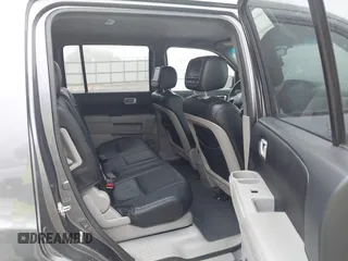 2014 Honda Pilot LX with VIN 5FNYF4H2XEB004614, listed as a IAAI auction lot 42236980 with 160,357 mi miles and . Bid and sale history available at DreamBid. Image 8.