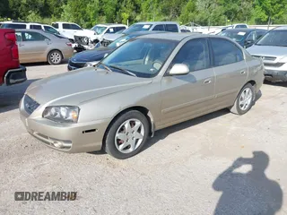 2005 Hyundai Elantra GLS with VIN KMHDN46DX5U109033, listed as a IAAI auction lot 42586032 with 119,550 mi miles and . Bid and sale history available at DreamBid. Image 2.