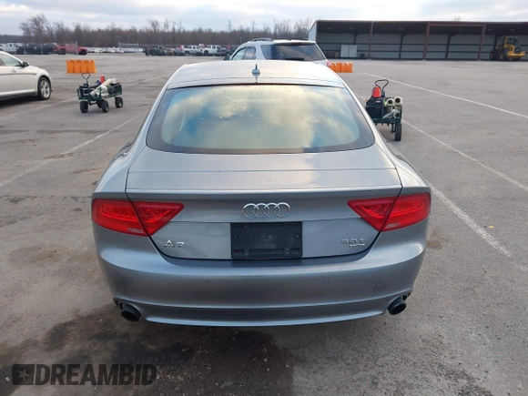 2014 Audi A7 Premium Plus z VIN WAUWGAFC9EN096702, wystawiony jako IAAI lot #41202201 z przebiegiem 103 893 mil mil oraz . Historia ofert i sprzedaży dostępna na DreamBid. Obrazek 16.