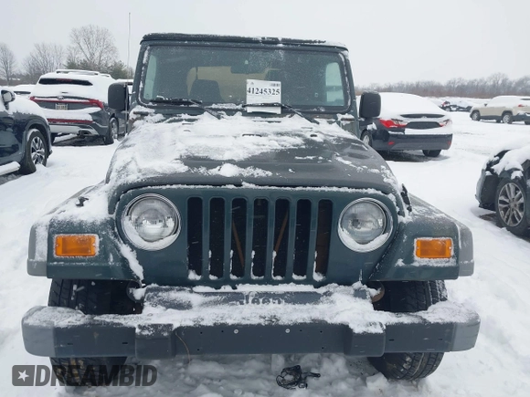2004 Jeep Wrangler SE with VIN 1J4FA29154P778915, listed as a IAAI auction lot 41245325 with 205,852 mi miles and . Bid and sale history available at DreamBid. Image 12.