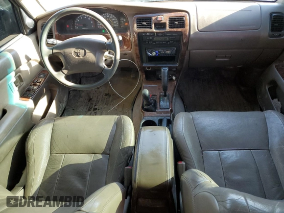1999 Toyota 4Runner Limited z VIN JT3HN87R3X0219430, wystawiony jako Copart lot #46487885 z przebiegiem 453 337 mil mil oraz Szkoda całkowita • Salvage title. Historia ofert i sprzedaży dostępna na DreamBid. Obrazek 8.