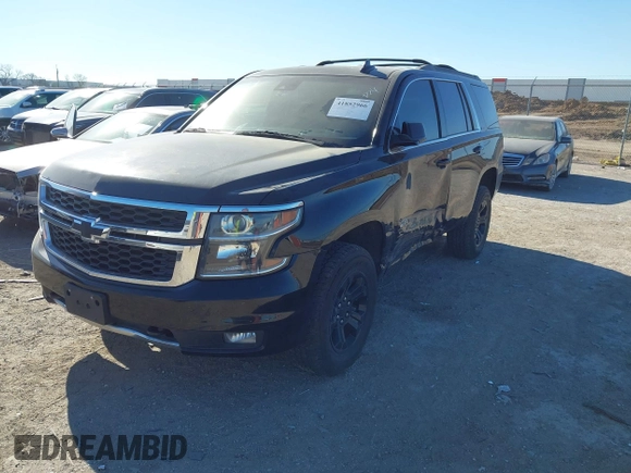 2017 Chevrolet Tahoe LT with VIN 1GNSKBKC6HR394138, listed as a IAAI auction lot 41852966 with 130,711 mi miles and . Bid and sale history available at DreamBid. Image 17.