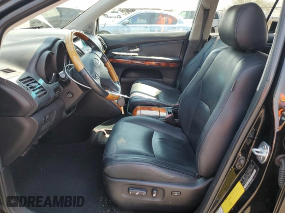 2005 Lexus RX 330 with VIN 2T2GA31U65C036959, listed as a Copart auction lot 64513135 with 128,900 mi miles and Salvage title. Bid and sale history available at DreamBid. Image 7.