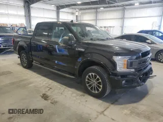 2018 Ford F-150 XL with VIN 1FTEW1EP1JFC00903, listed as a Copart auction lot 52090235 with 83,644 mi miles and Salvage Title. Bid and sale history available at carsss.com. Image 4.