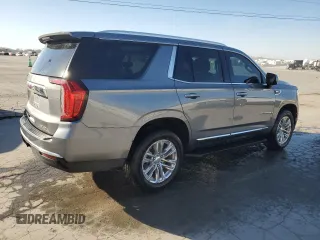 2021 GMC Yukon SLT with VIN 1GKS1BKD9MR194633, listed as a Copart auction lot 48762645 with 56,502 mi miles and Salvage Title. Bid and sale history available at carsss.com. Image 3.
