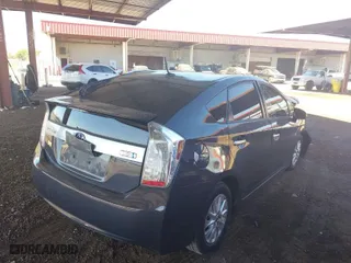 2013 Toyota Prius Plug-In with VIN JTDKN3DP2D3048364, listed as a IAAI auction lot 40704606 with NaN miles. Bid and sale history available at carsss.com. Image 4.