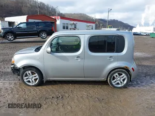 2009 Nissan Cube SL z VIN JN8AZ28R99T111414, wystawiony jako IAAI lot #41542454 z przebiegiem 117 297 mil mil oraz . Historia ofert i sprzedaży dostępna na DreamBid. Obrazek 14.
