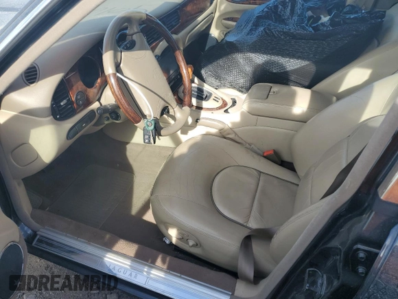 1999 Jaguar XJ z VIN SAJKD6043XC872105, wystawiony jako Copart lot #86270724 z przebiegiem Nie podano mil oraz Szkoda całkowita • Salvage title. Historia ofert i sprzedaży dostępna na DreamBid. Obrazek 7.