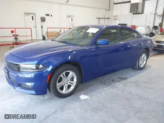 2022 Dodge Charger SXT with VIN 2C3CDXBGXNH231158, listed as a IAAI auction lot 41980059 with 61,770 mi miles. Bid and sale history available at carsss.com. Image 2.