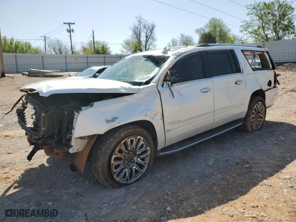 2016 GMC Yukon XL Denali with VIN 1GKS2HKJ7GR394839, listed as a Copart auction lot 52114765 with 122,308 mi miles and Salvage Title. Bid and sale history available at carsss.com. Image 1.