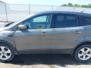 2013 Ford Escape SE with VIN 1FMCU0G92DUD71645, listed as a IAAI auction lot 42638354 with 112,128 mi miles and . Bid and sale history available at DreamBid. Image 14.