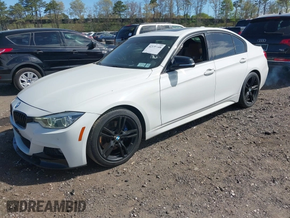 2017 BMW 3 Series 330i with VIN WBA8B9G32HNU52805, listed as a IAAI auction lot 42139448 with 136,333 mi miles. Bid and sale history available at carsss.com. Image 2.