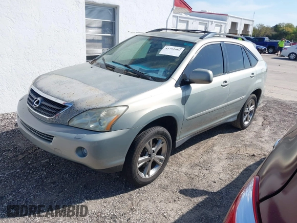 2007 Lexus RX 400h z VIN JTJGW31U272002926, wystawiony jako IAAI lot #41792083 z przebiegiem 227 063 mil mil oraz . Historia ofert i sprzedaży dostępna na DreamBid. Obrazek 2.
