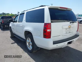 2007 Chevrolet Suburban LT with VIN 1GNFK16327J231618, listed as a IAAI auction lot 42172191 with 216,729 mi miles and . Bid and sale history available at DreamBid. Image 3.