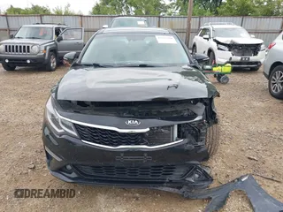 2019 Kia Optima LX z VIN 5XXGT4L3XKG297461, wystawiony jako IAAI lot #42322350 z przebiegiem 103 660 mil mil oraz . Historia ofert i sprzedaży dostępna na DreamBid. Obrazek 12.