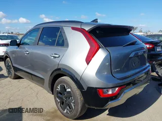 2024 Kia Niro Wind with VIN KNDCR3L11R5122388, listed as a IAAI auction lot 42261311 with 32,475 mi miles and . Bid and sale history available at DreamBid. Image 3.
