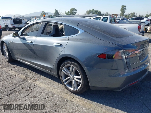 2014 Tesla Model S 60 with VIN 5YJSA1S11EFP35998, listed as a IAAI auction lot 42316563 with 83,835 mi miles and . Bid and sale history available at DreamBid. Image 3.