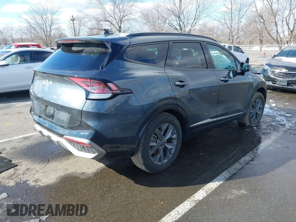 2023 Kia Sportage SX-Prestige with VIN KNDPXCAG5P7038476, listed as a IAAI auction lot 41532005 with 14,151 mi miles and . Bid and sale history available at DreamBid. Image 4.