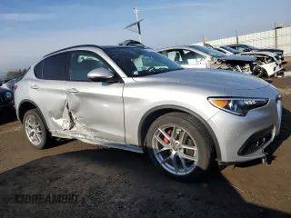 2019 Alfa Romeo Stelvio Ti z VIN ZASPAKBN2K7C40054, wystawiony jako Copart lot #86020774 z przebiegiem 16 135 mil mil oraz Szkody całkowita. Historia ofert i sprzedaży dostępna na DreamBid. Obrazek 4.
