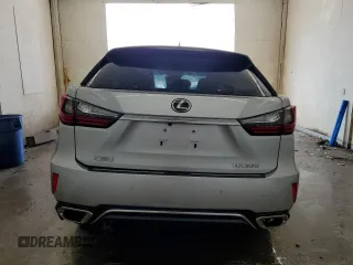 2016 Lexus RX 350 with VIN 2T2BZMCA1GC032722, listed as a Copart auction lot 59550625 with 124,611 mi miles and Salvage title. Bid and sale history available at DreamBid. Image 6.
