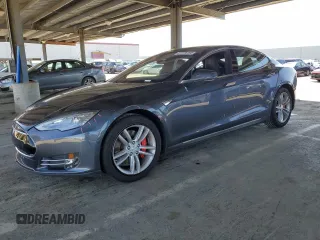 2014 Tesla Model S 60 with VIN 5YJSA1H17EFP63229, listed as a Copart auction lot 51776195 with 156,356 mi miles and Salvage Title. Bid and sale history available at DreamBid. Image 1.