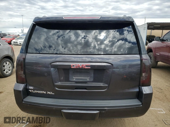 2018 GMC Yukon XL SLT with VIN 1GKS2GKC0JR136892, listed as a Copart auction lot 61352354 with 101,093 mi miles and Clean Title. Bid and sale history available at carsss.com. Image 6.