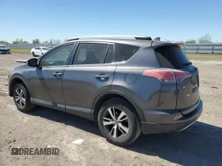2018 Toyota RAV4 XLE with VIN JTMWFREV3JJ729302, listed as a Copart auction lot 49823765 with 100,576 mi miles and Salvage Title. Bid and sale history available at DreamBid. Image 2.