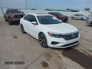 2021 Volkswagen Passat SE z VIN 1VWSA7A30MC016627, wystawiony jako IAAI lot #41904846 z przebiegiem 56 969 mil mil oraz . Historia ofert i sprzedaży dostępna na DreamBid. Obrazek 1.