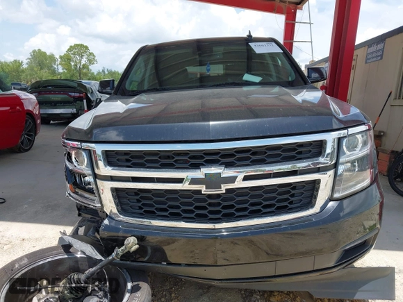 2019 Chevrolet Tahoe LT z VIN 1GNSKBKCXKR361392, wystawiony jako IAAI lot #42661332 z przebiegiem 112 973 mil mil oraz . Historia ofert i sprzedaży dostępna na DreamBid. Obrazek 13.