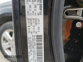 2012 Dodge Journey SXT z VIN 3C4PDCBG2CT314562, wystawiony jako Copart lot #57500195 z przebiegiem 156 319 mil mil oraz Szkoda całkowita • Salvage title. Historia ofert i sprzedaży dostępna na DreamBid. Obrazek 13.