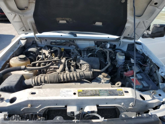 2010 Ford Ranger XL with VIN 1FTKR1AD9APA75973, listed as a Copart auction lot 56220795 with 98,648 mi miles and Salvage title. Bid and sale history available at DreamBid. Image 11.