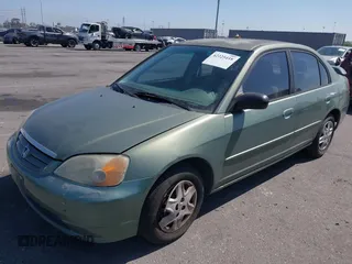2003 Honda Civic LX with VIN 2HGES16553H559537, listed as a IAAI auction lot 42225418 with 239,140 mi miles and . Bid and sale history available at DreamBid. Image 2.