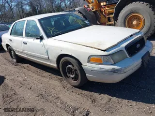 2010 Ford Crown Victoria with VIN 2FABP7AV6AX138688, listed as a IAAI auction lot 41774614 with 999,999 mi miles. Bid and sale history available at carsss.com. Image 1.