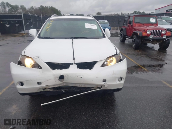 2010 Lexus RX with VIN 2T2BK1BA1AC042713, listed as a IAAI auction lot 41750057 with 193,495 mi miles. Bid and sale history available at carsss.com. Image 12.